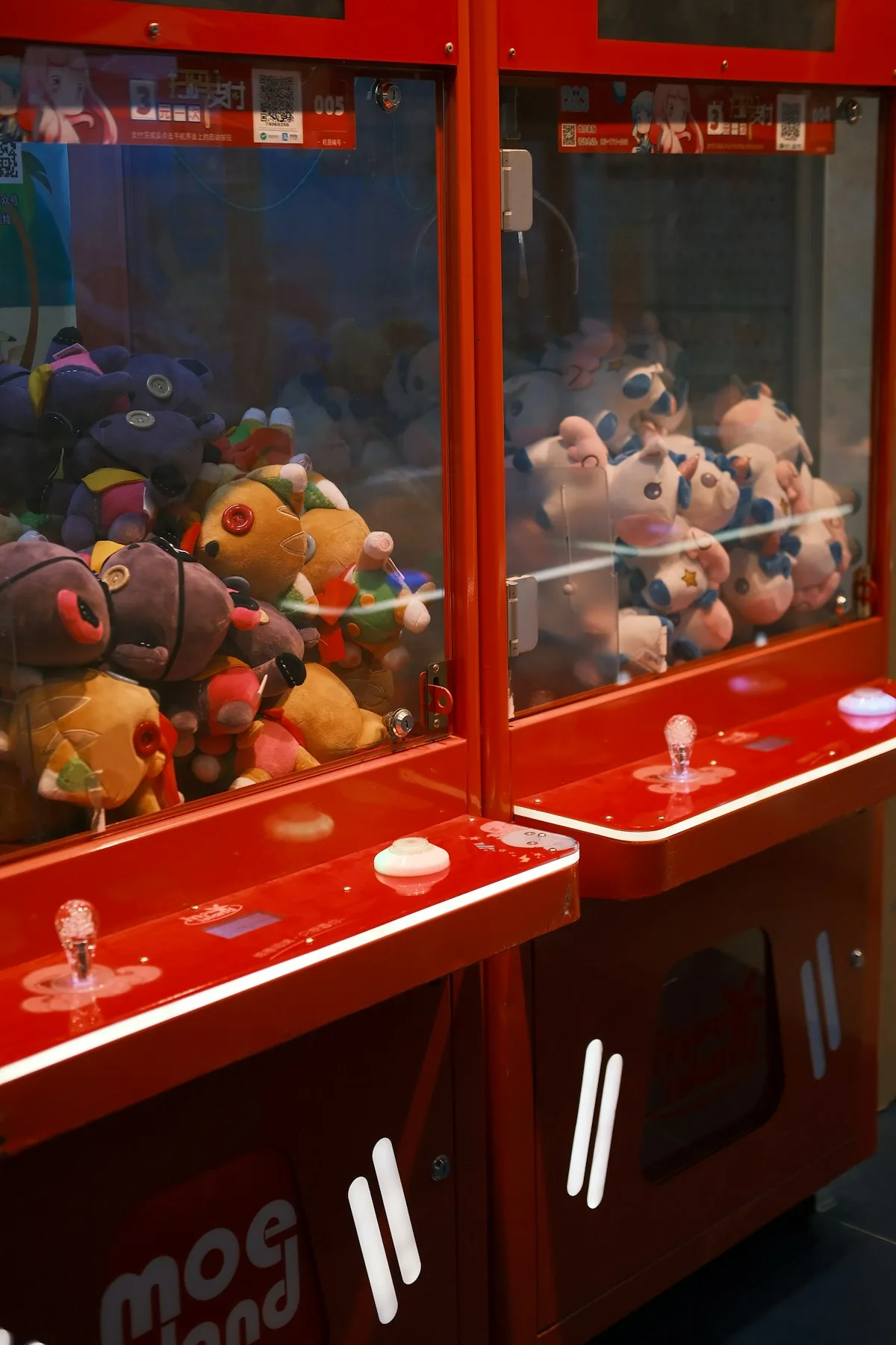 Collectible capsule toys in a vending machine — the physical ancestor of gacha mechanics
